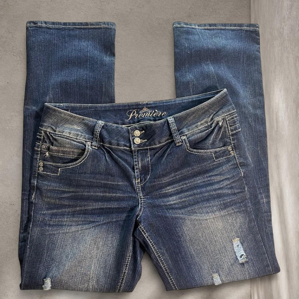 Y2K Premiere Low rise flare jeans with sun design on back pockets